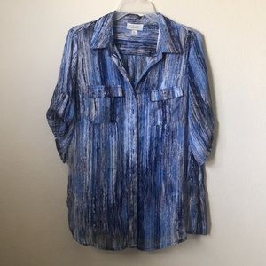 This is a Blouse shirt that comes with a tank top.